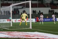 Jozef Kaplan (second from right) conceded a late penalty in the game